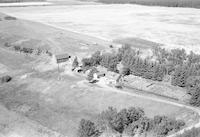 Aerial photograph of a farm near Borden, SK (40-8-W3)