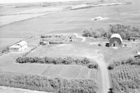 Aerial photograph of a farm near Vawn, SK (48-19-W3)