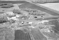 Aerial photograph of a farm near Great Deer, SK (33-41-8-W3)