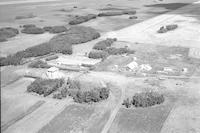 Aerial photograph of a farm in Saskatchewan (6-44-7-W3)