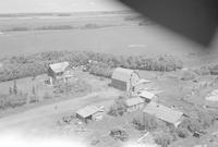 Aerial photograph of a farm near Tallman, SK (3-44-7-W3)