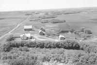 Aerial photograph of a farm near Redberry Park, SK (41-9-W3)