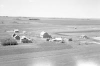 Aerial photograph of a farm near Battleford, SK (42-16-W3)