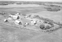 Aerial photograph of a farm near Keatley, SK (44-11-W3)