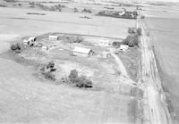 Aerial photograph of a farm near Hafford, SK (44-10-W3)