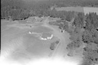 Aerial photograph of a farm near Leask, SK (46-6-W3)