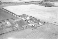 Aerial photograph of a farm near Maidstone, SK (47-23-W3)
