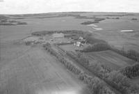 Aerial photograph of a farm near Wilkie, SK (6-40-19-W3)