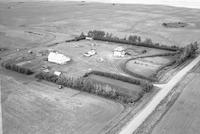 Aerial photograph of a farm near Blaine Lake, SK (3-44-7-W3)