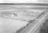 Aerial photograph of a farm near Cutknife, SK (4-43-22-W3)