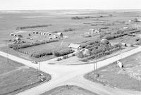 Aerial photograph of a farm near S. Makwa, SK (58-20-W3)