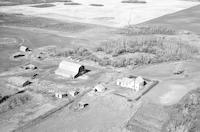 Aerial photograph of a farm near Borden, SK (33-40-8-W3)