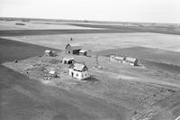 Aerial photograph of a farm near Mayfair, SK (46-12-W3)