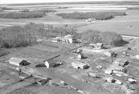 Aerial photograph of a farm near Kerrobert, SK (34-21-W3)