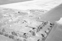 Aerial photograph of a farm near S. Makwa, SK (58-20-W3)