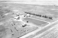 Aerial photograph of a farm near Mervin, SK (51-20-W3)