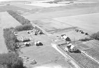 Aerial photograph of a farm in Saskatchewan (42-22-W3)