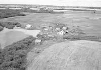 Aerial photograph of a farm near Kelfield, SK (34-20-W3)