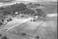 Aerial photograph of a farm near Ferrobert, SK (34-21-W3)