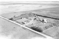 Aerial photograph of a farm near Borden, SK (22-41-9-W3)