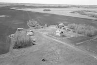 Aerial photograph of a farm near Kerrobert, SK (34-21-W3)