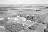 Aerial photograph of a farm near Speers, SK (44-11-W3)