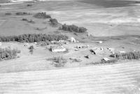 Aerial photograph of a farm near Borden, SK (41-8-W3)