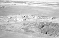 Aerial photograph of a farm near Paradise Hill, SK (51-29-W3)