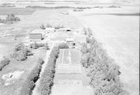 Aerial photograph of a farm near Blaine Lake, SK (45-7-W3)