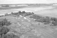 Aerial photograph of a farm near Revenue, SK (12-38-21-W3)