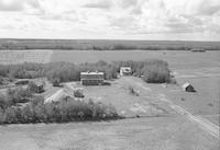 Aerial photograph of a farm near Mervin, SK (51-20-W3)