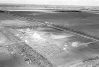 Aerial photograph of a farm in Saskatchewan (48-28-W3)