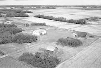 Aerial photograph of a farm in Saskatchewan (48-28-W3)