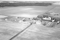 Aerial photograph of a farm near Hafford, SK (44-10-W3)