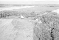 Aerial photograph of a farm near Hafford, SK (44-10-W3)