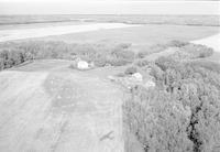 Aerial photograph of a farm near Hafford, SK (44-10-W3)