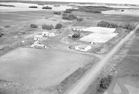 Aerial photograph of a farm near Wilkie, SK (41-18-W3)