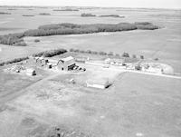 Aerial photograph of a farm near Borden, SK (13-40-9-W3)