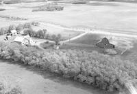 Aerial photograph of a farm near Edam, SK (49-20-W3)