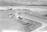 Aerial photograph of a farm near Borden, SK (22-41-8-W3)