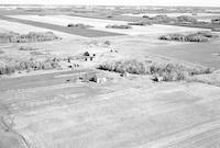 Aerial photograph of a farm near Maidstone, SK (47-23-W3)