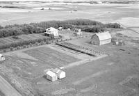 Aerial photograph of a farm in Saskatchewan (27-45-16-W3)