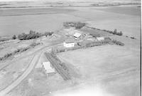 Aerial photograph of a farm in Saskatchewan (48-28-W3)