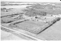 Aerial photograph of a farm near Maymont, SK (10-42-12-W3)