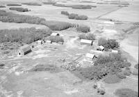 Aerial photograph of a farm near Maymont, SK (13-42-12-W3)