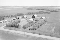 Aerial photograph of a farm near Maymont, SK (6-42-12-W3)