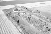 Aerial photograph of a farm in Saskatchewan (34-41-21-W3)