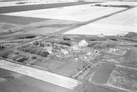 Aerial photograph of a farm in Saskatchewan (26-41-21-W3)