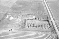 Aerial photograph of a farm in Saskatchewan (8-41-21-W3)