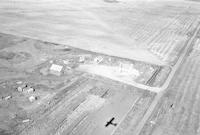 Aerial photograph of a farm near Phippen, SK (9-41-21-W3)